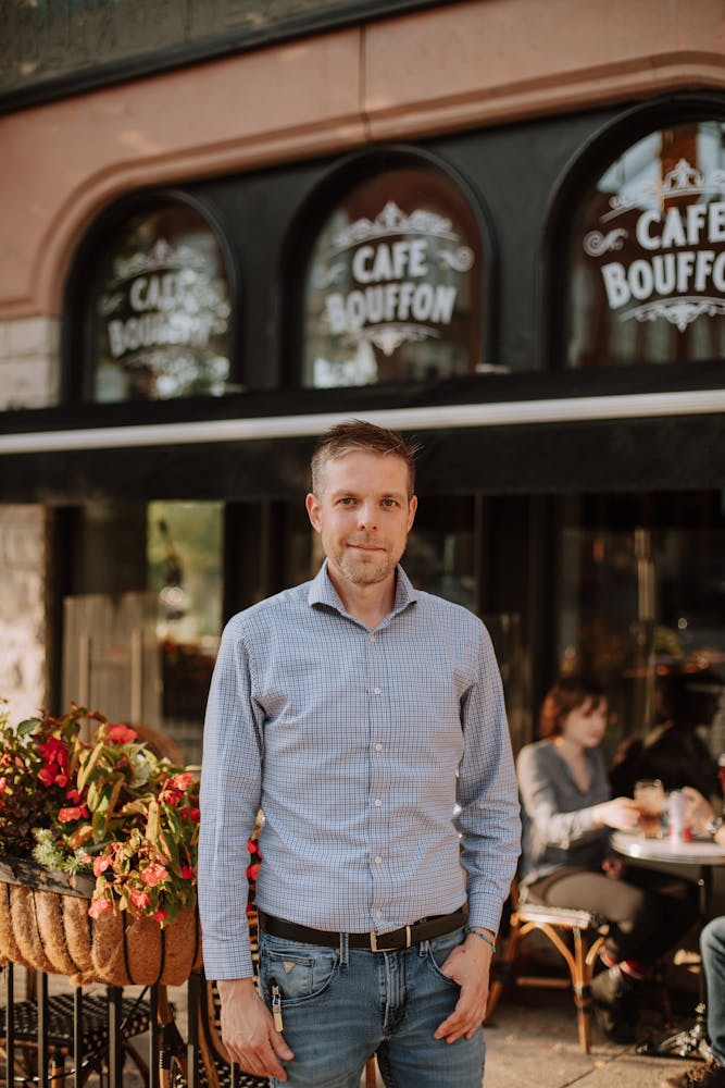 a person standing in front of a store