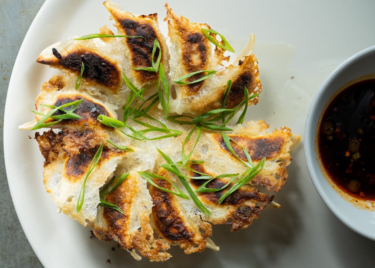 a close up of a plate of dumplings