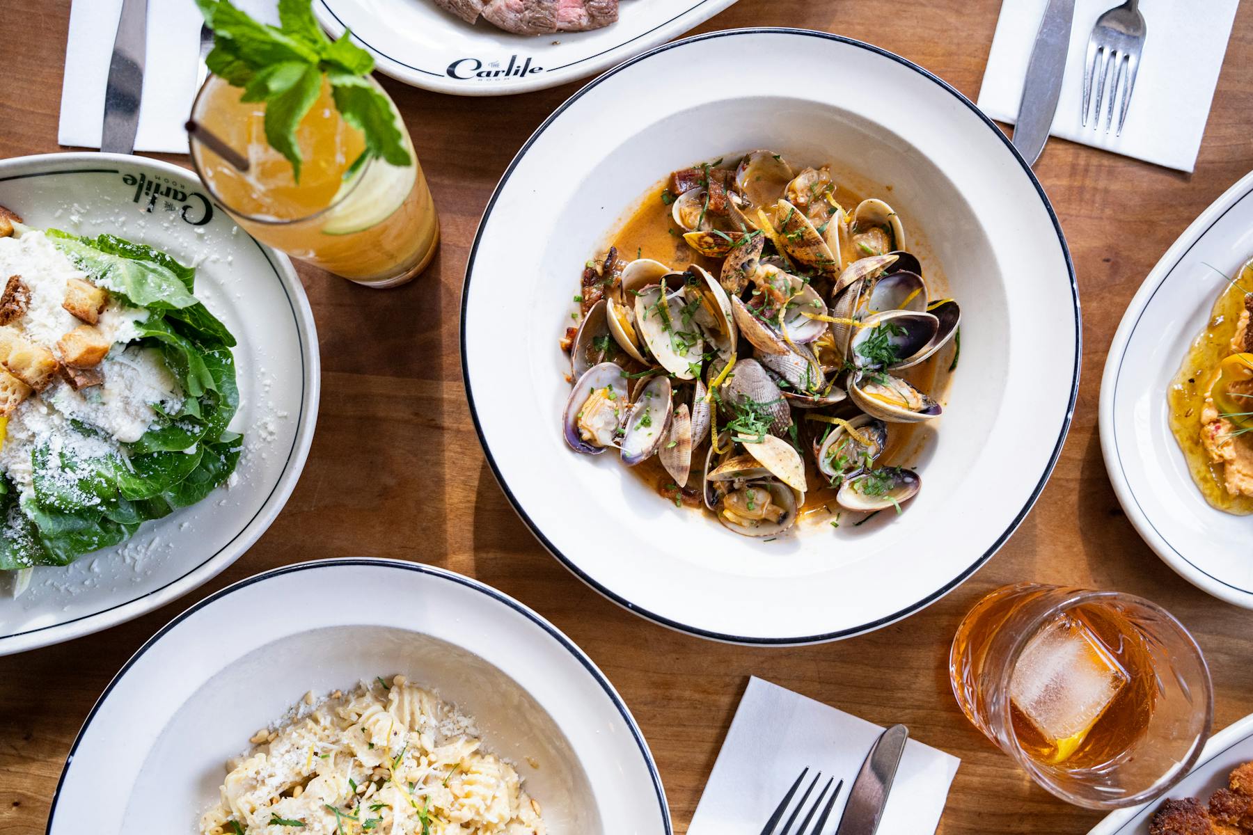 a plate is filled with different types of food on a table