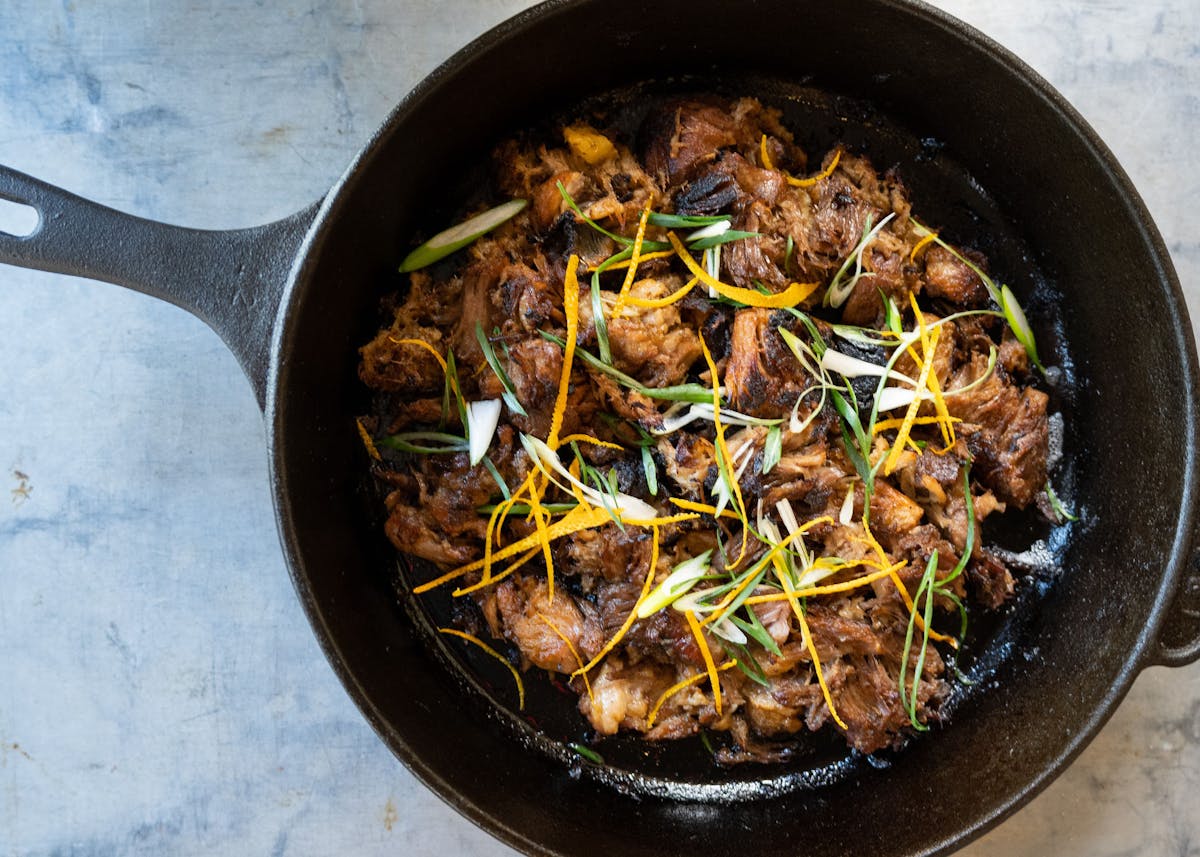 a bowl of food sitting on a pan