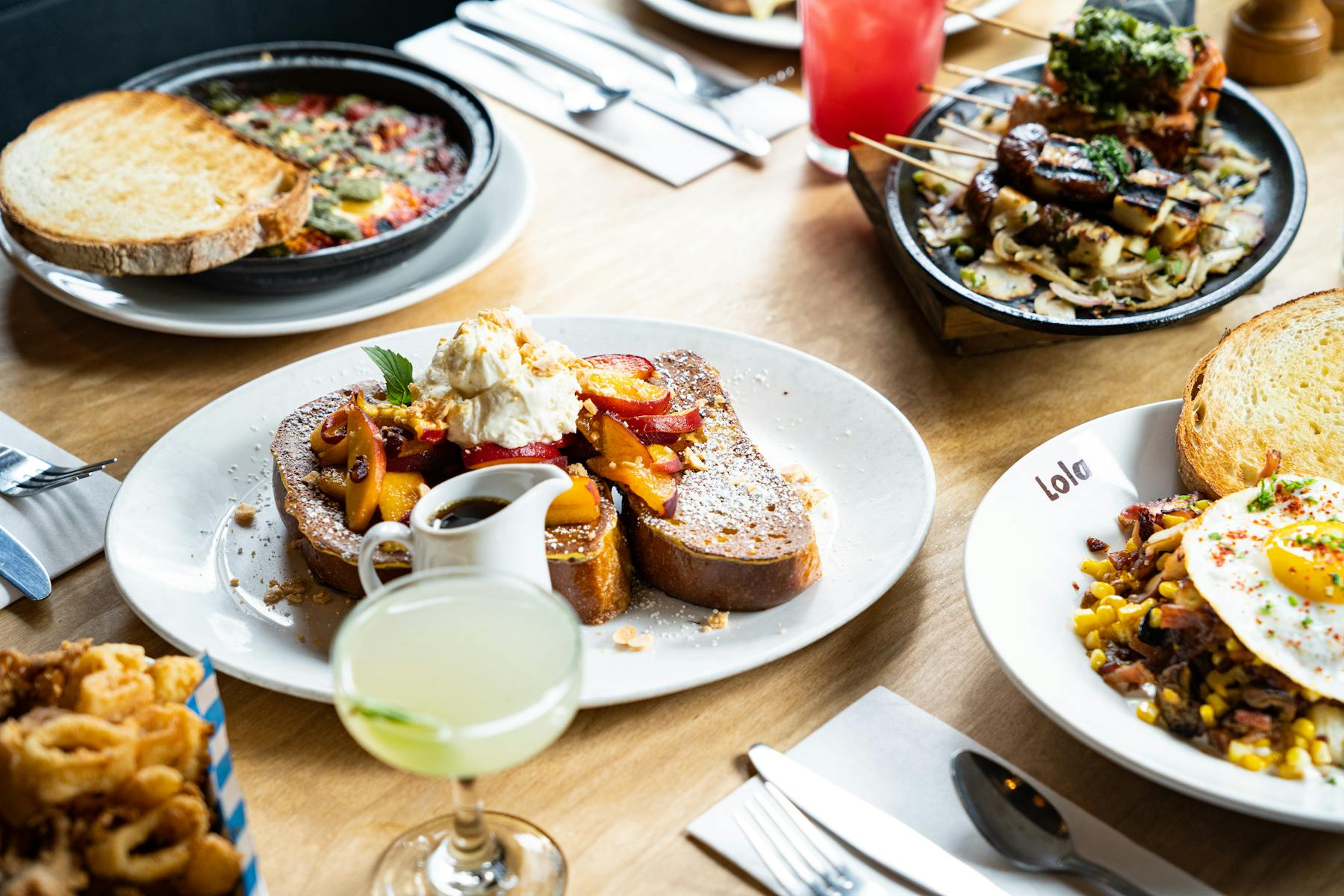 a table topped with plates of food on a plate