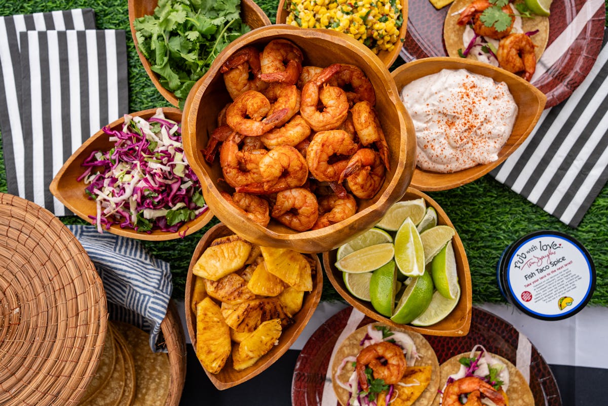 table spread of grilled shrimp tacos