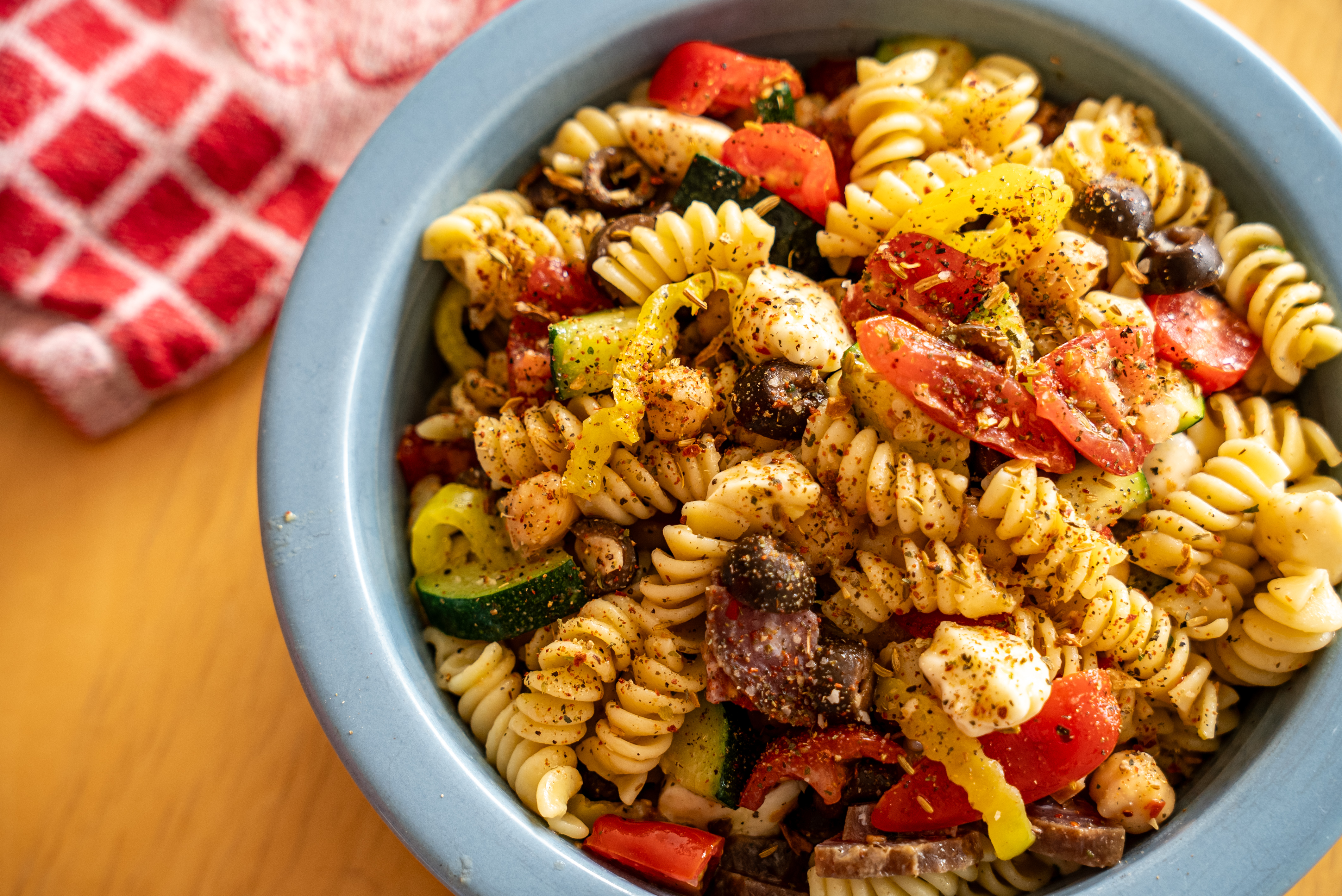 a bowl of picnic pasta salad