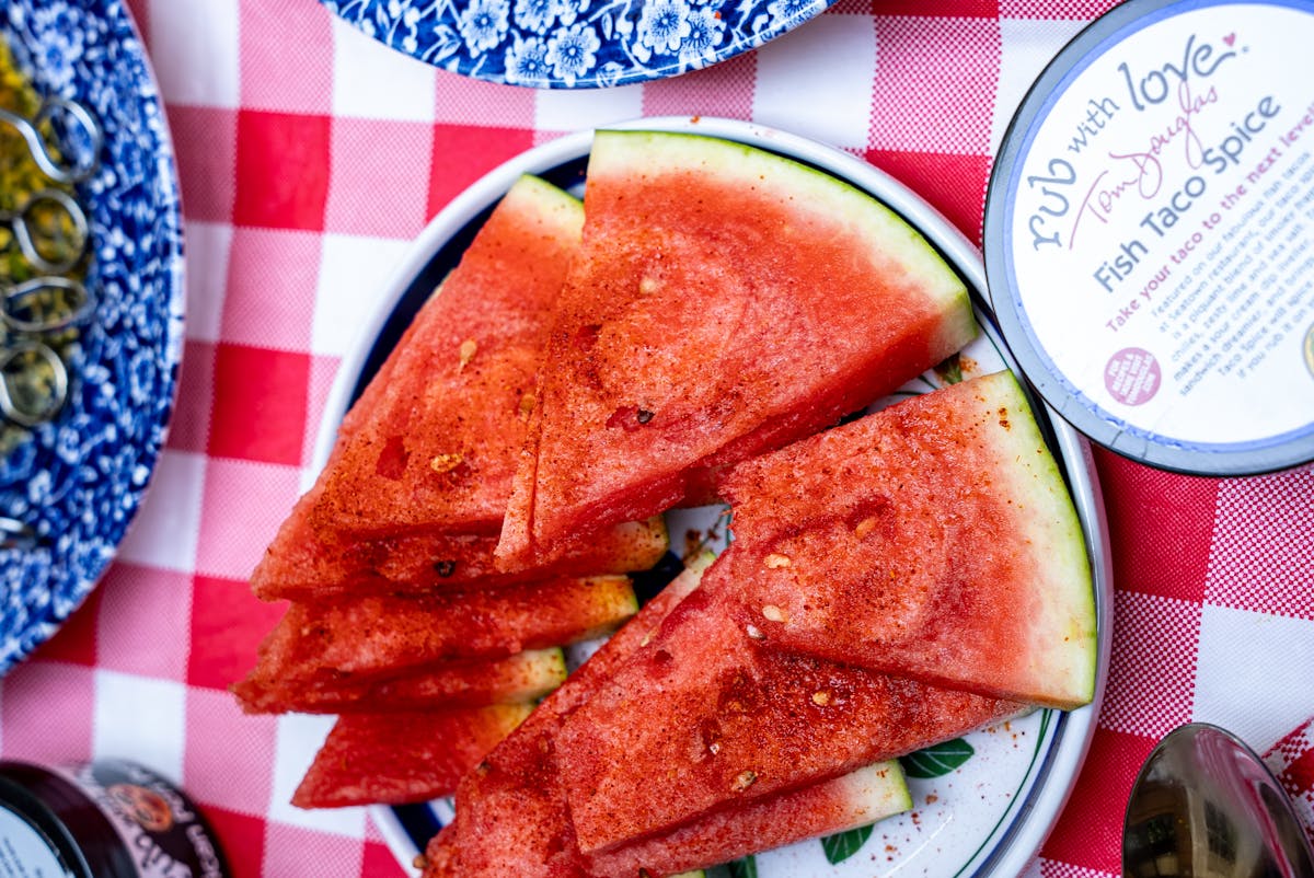 watermelon slices sprinkled with fish taco spicce