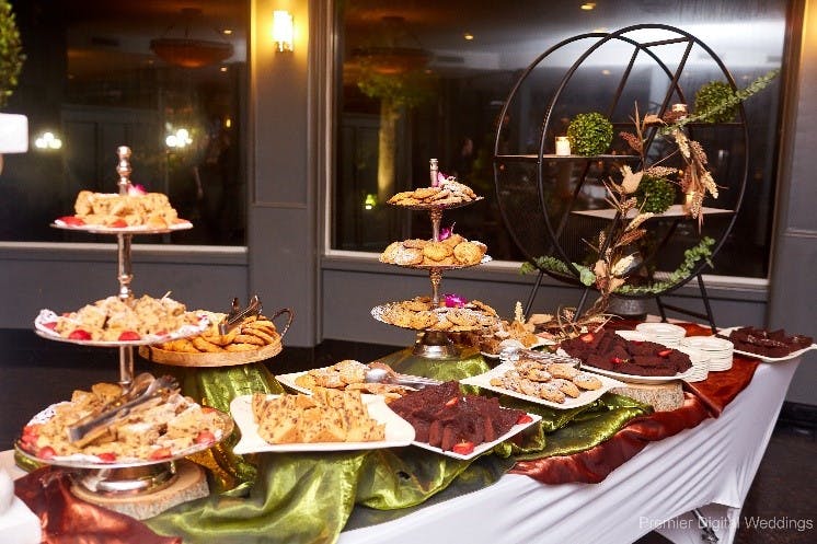 A table full of food
Description automatically generated with low confidence