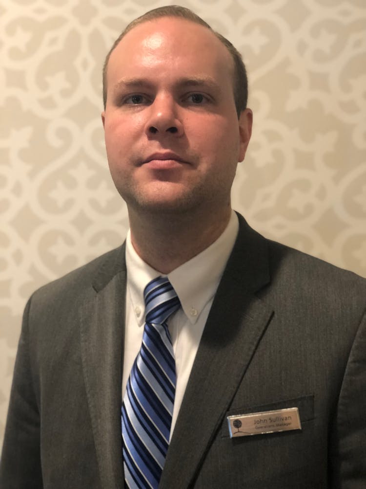a man wearing a suit and tie