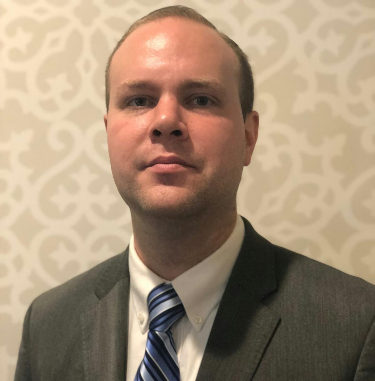 A Man Wearing a Suit and Tie