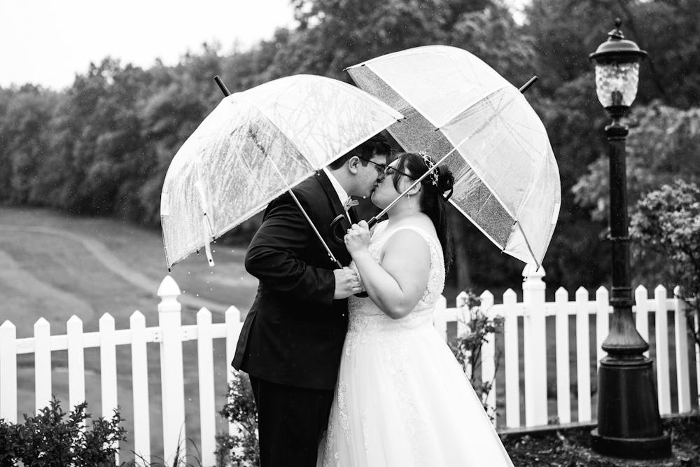 a married couple kissing