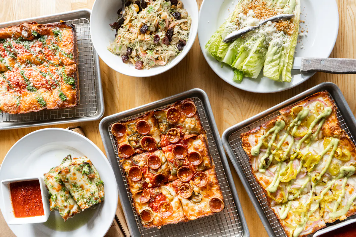 a box filled with different types of food on a plate