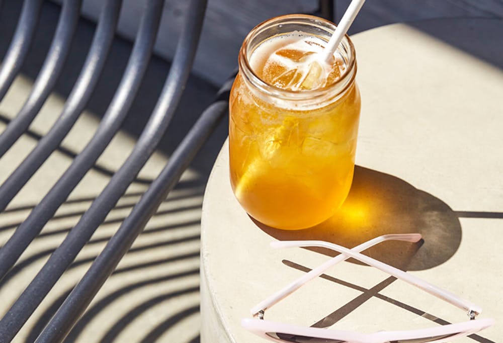 a cup of coffee and a glass of orange juice