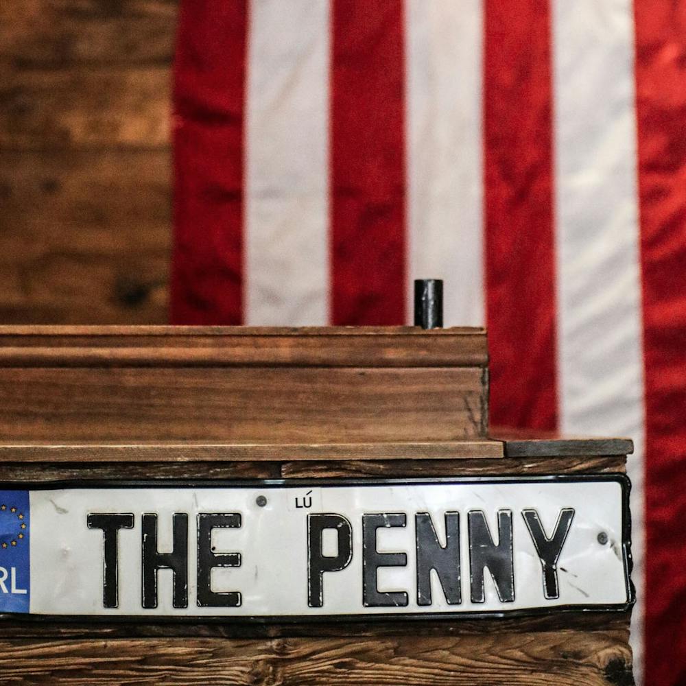 a close up of The Penny sign