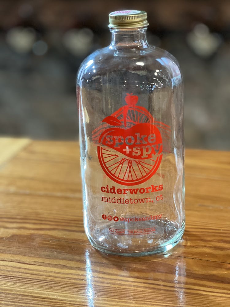 an empty bottle on a table