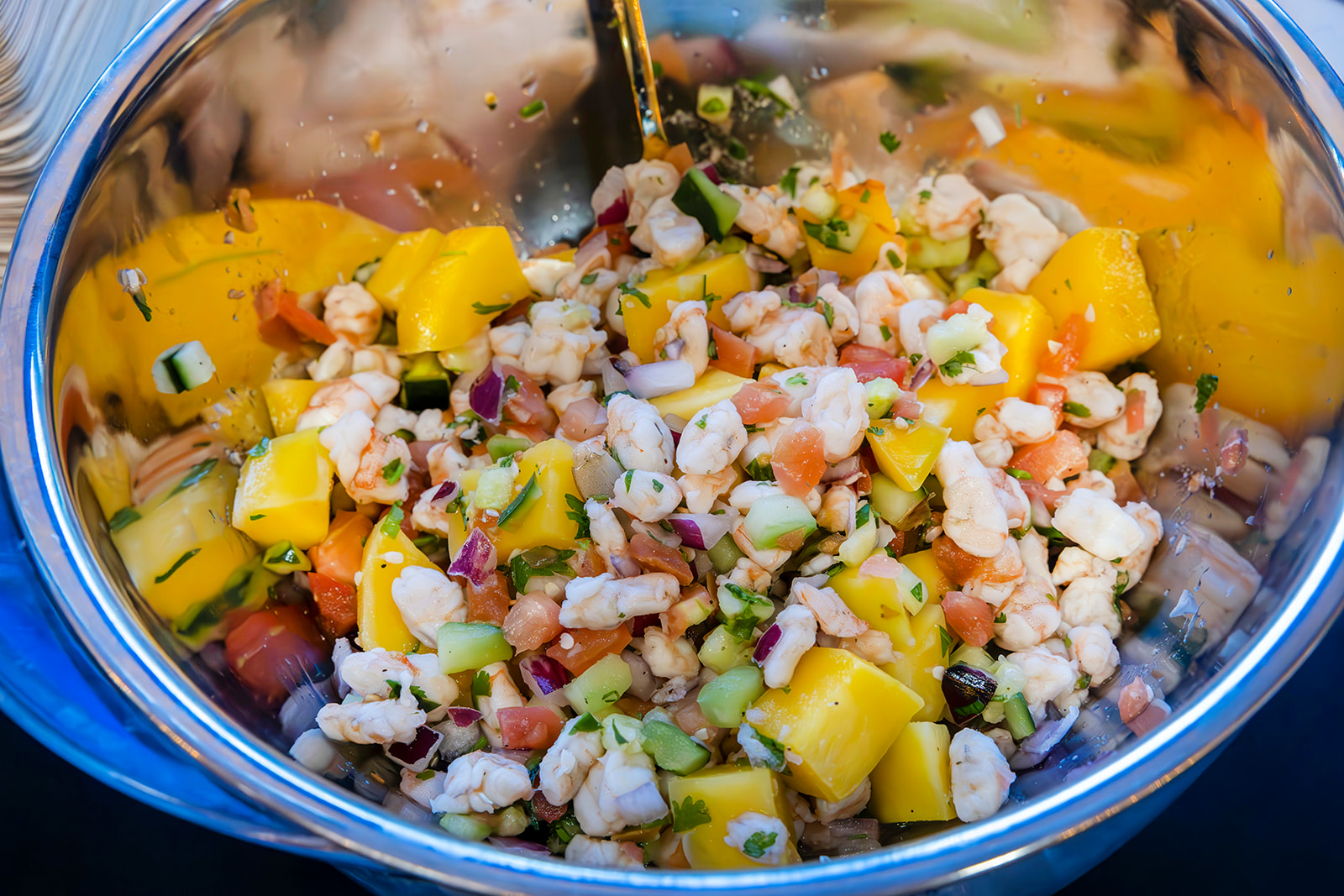 a blue bowl filled with food
