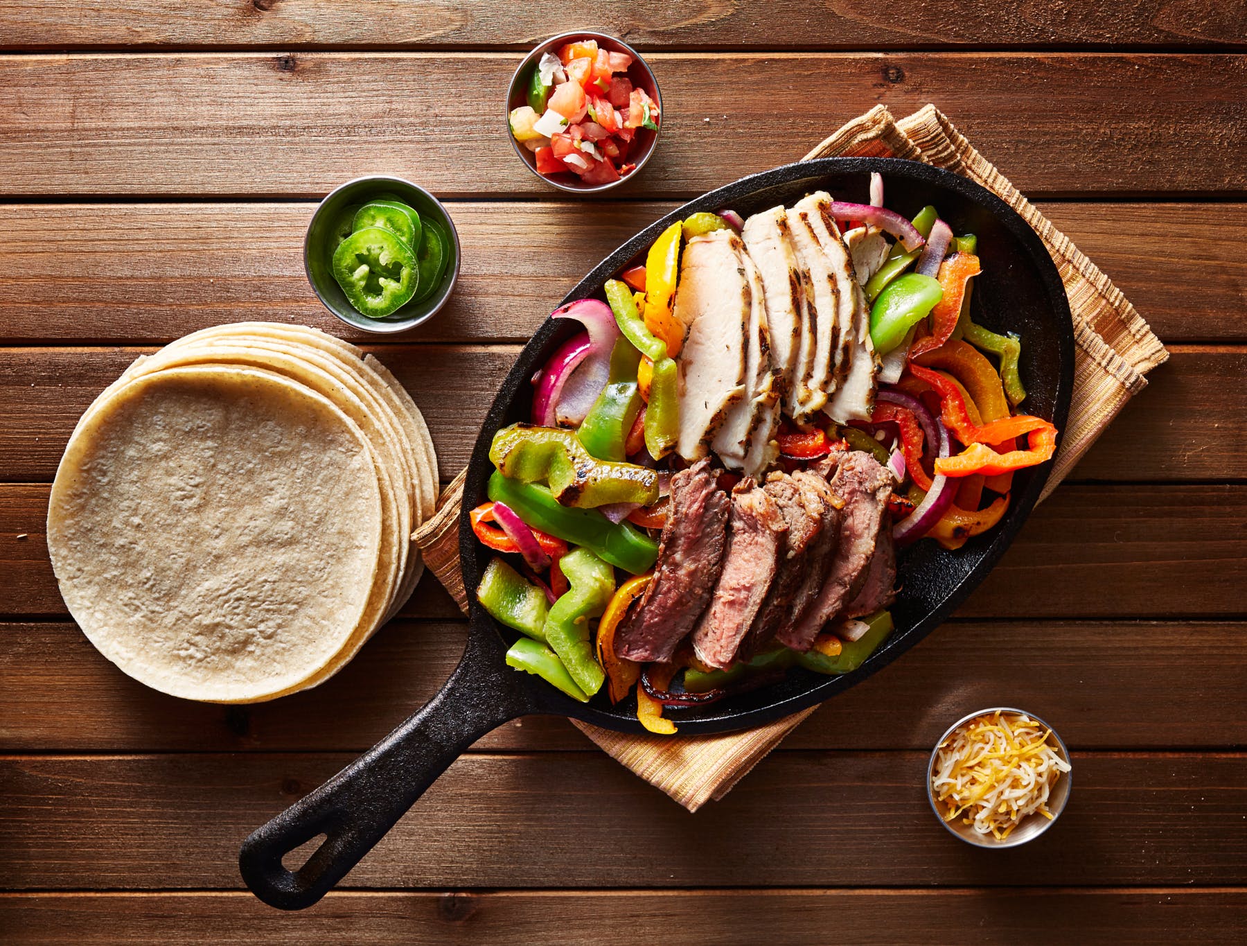 a plate of food on a wooden table