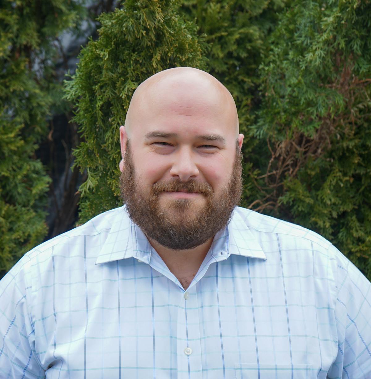 a man wearing a blue shirt