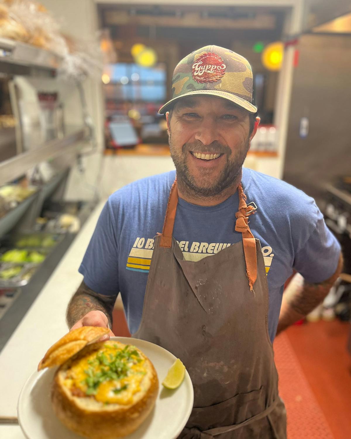 a man standing in front of a plate of food