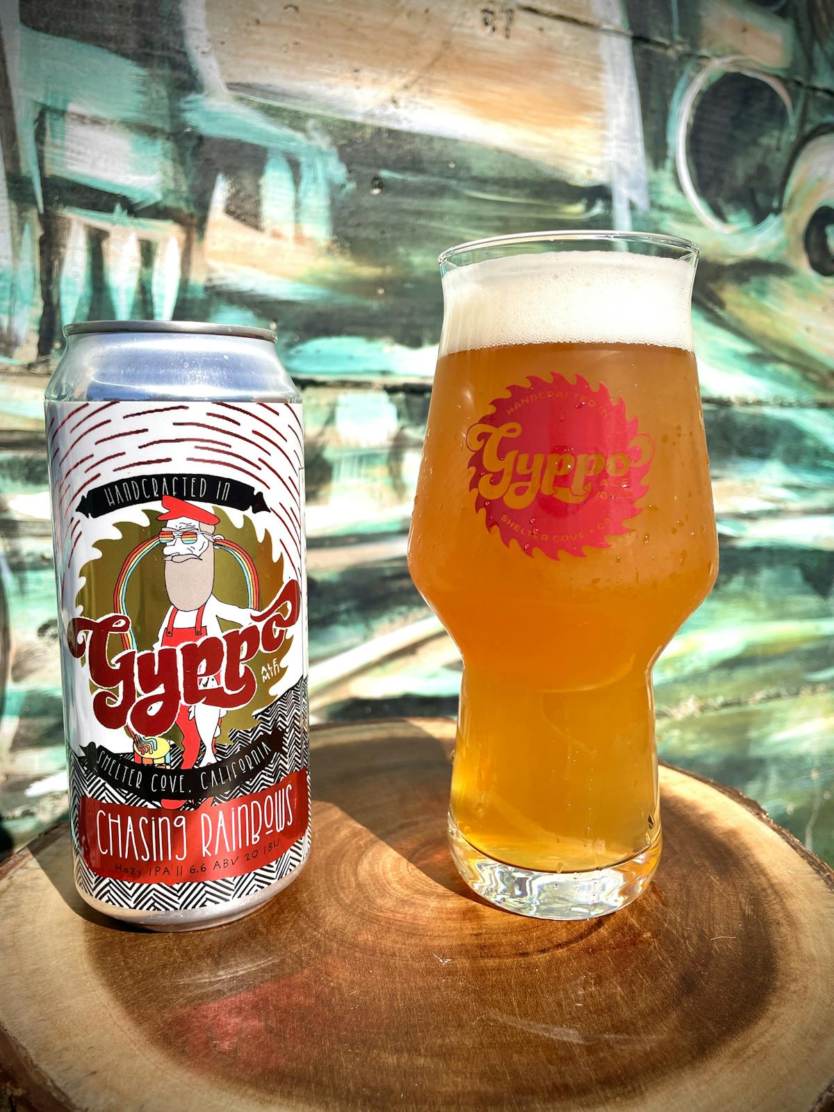 a bottle and a glass of beer on a table