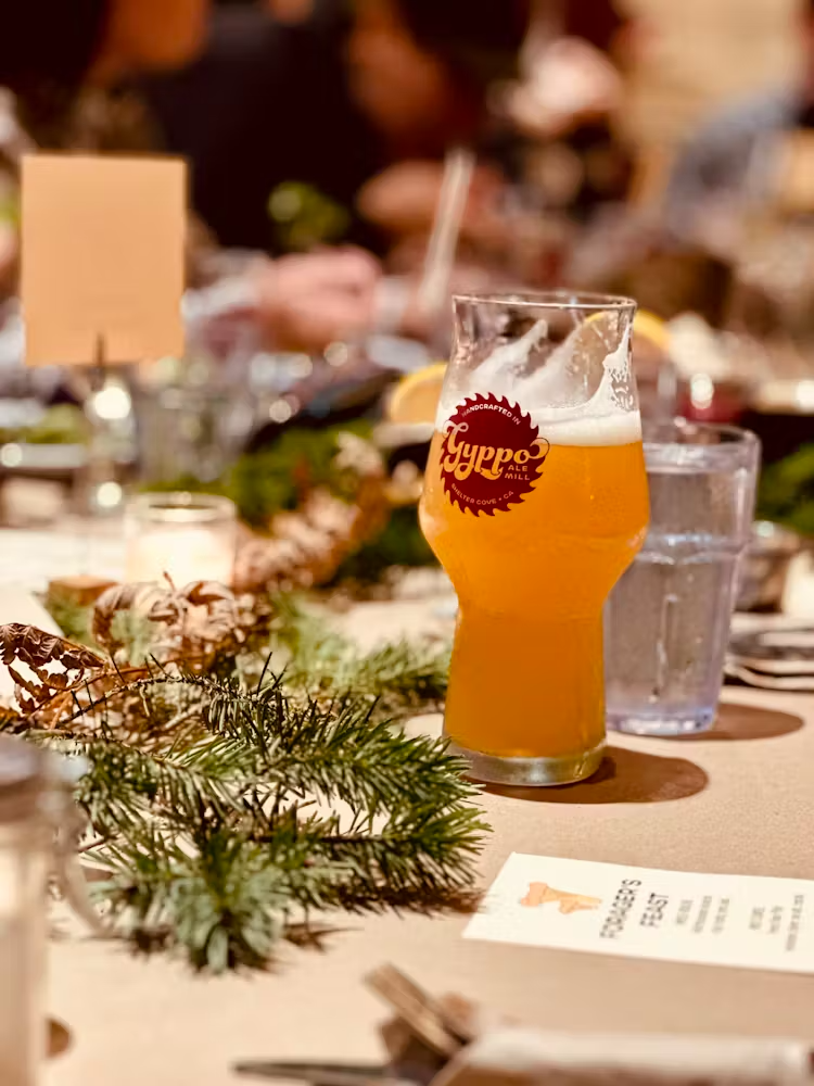 a close up of a glass cup on a table