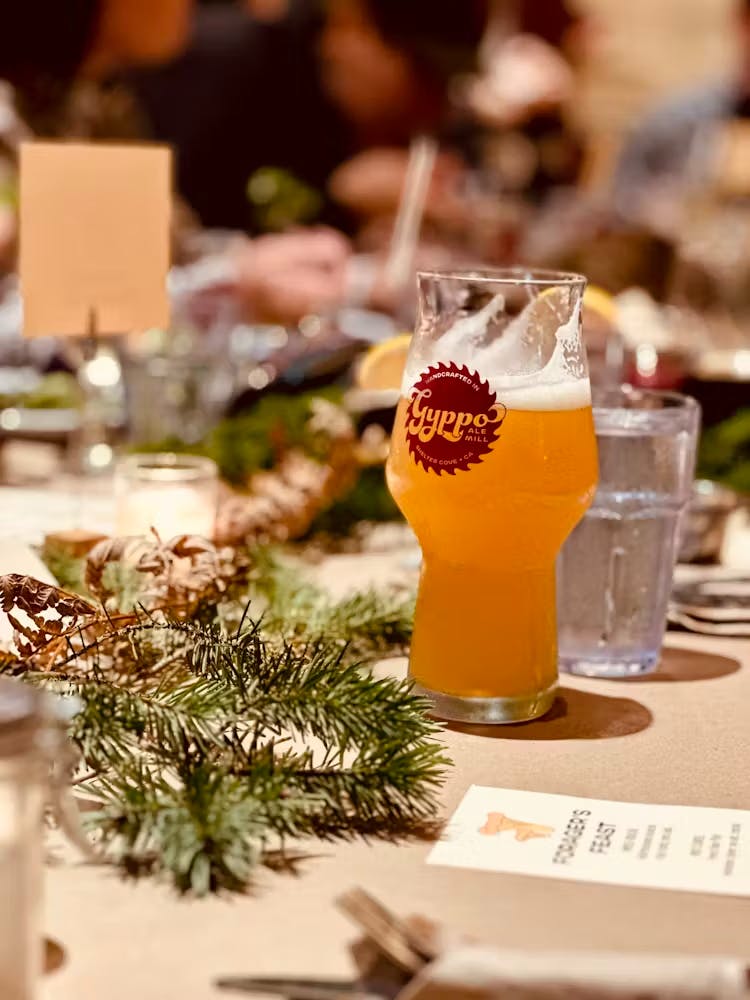 a close up of a glass cup on a table
