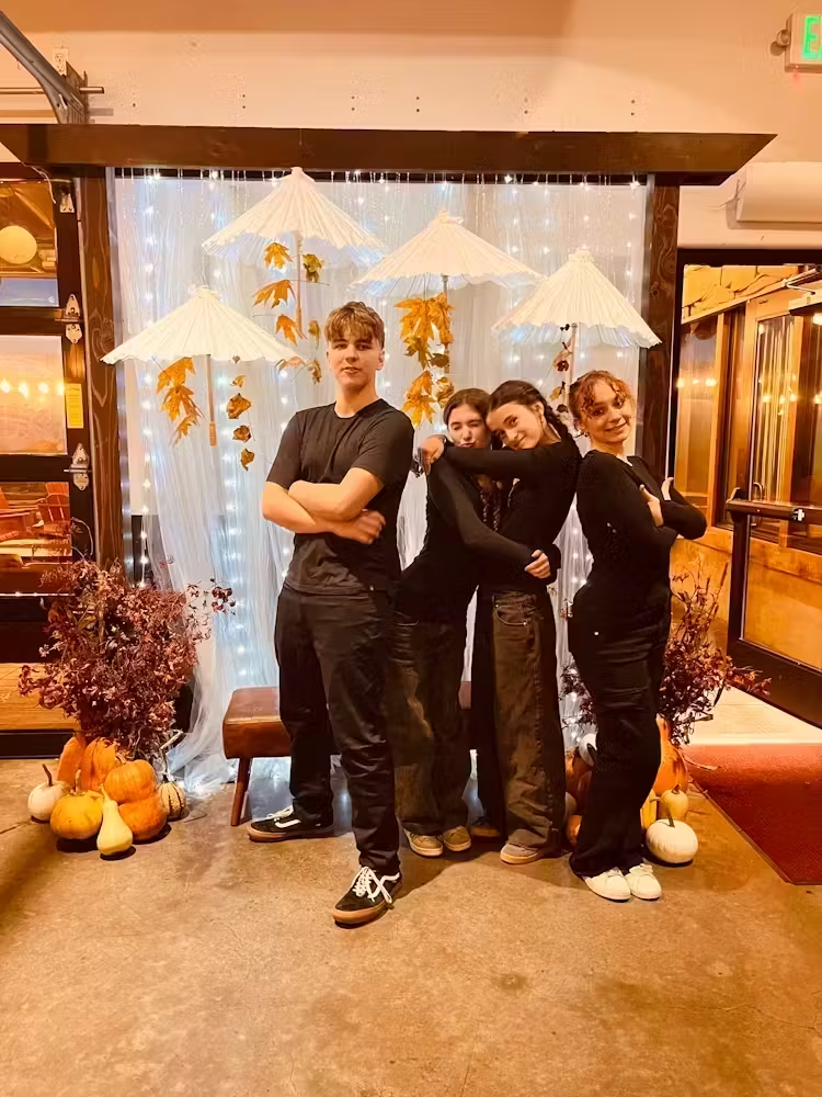 a group of people standing in a room