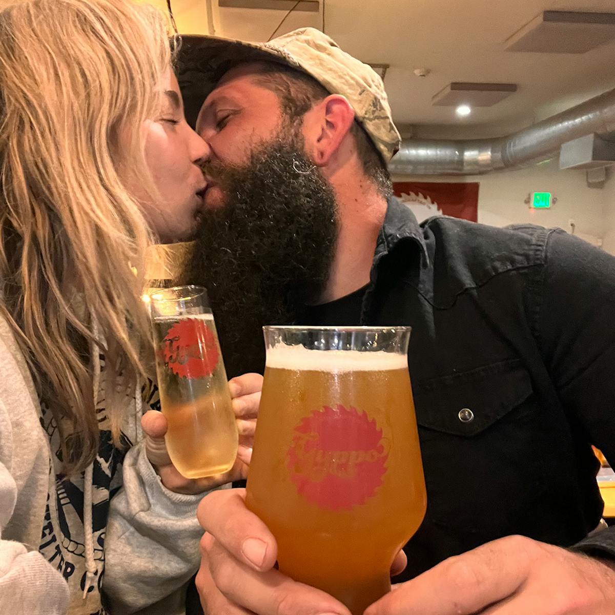 a man and a woman taking a selfie