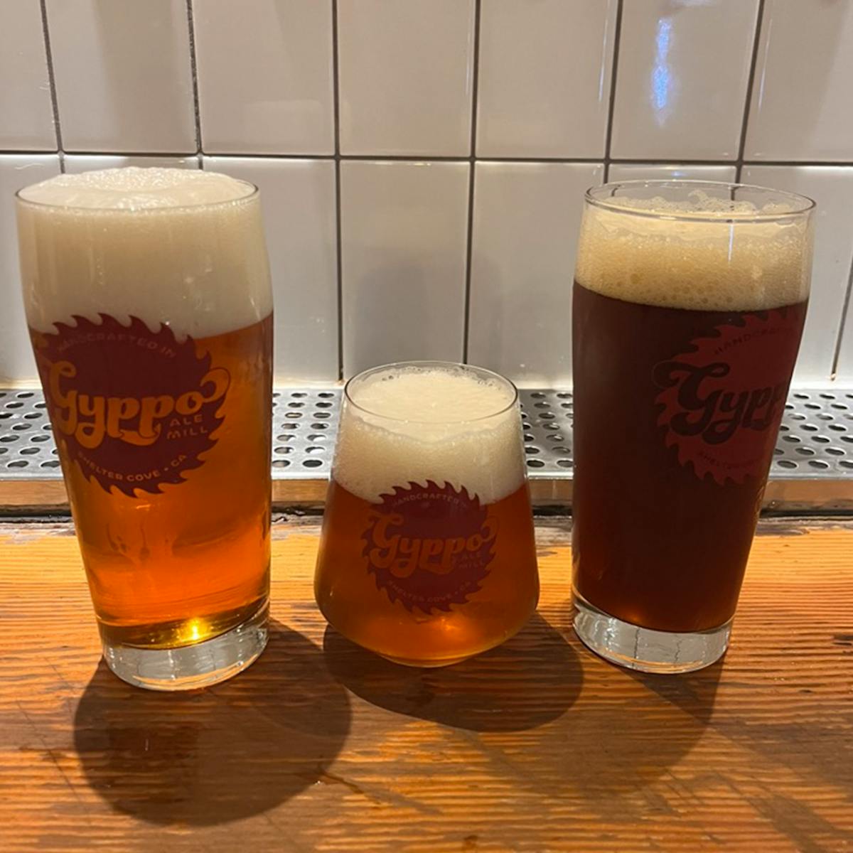 a glass of beer on a table