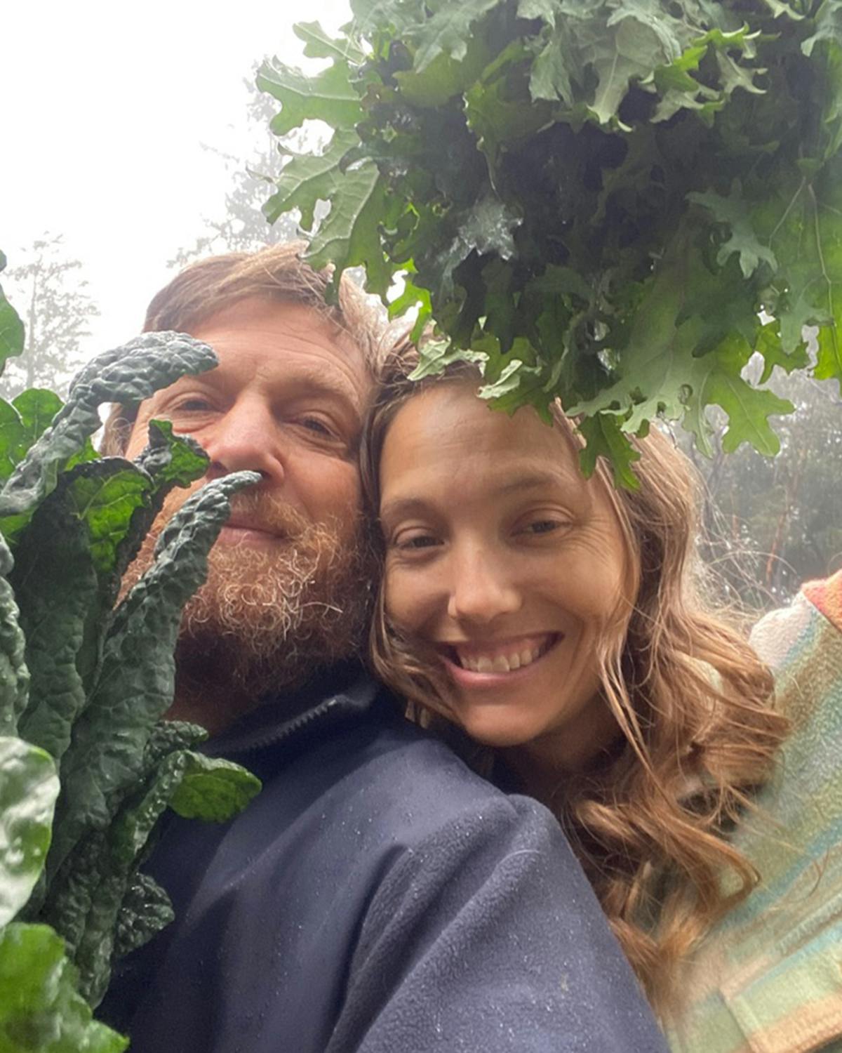 a person in a garden smiling