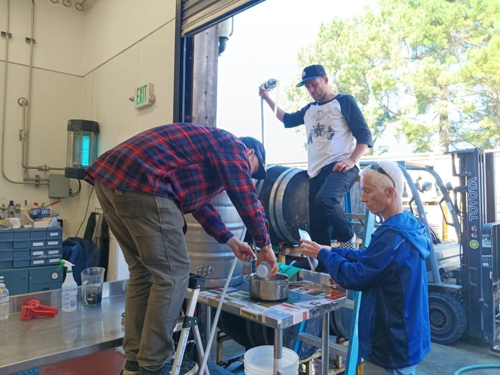 a group of people standing in a room