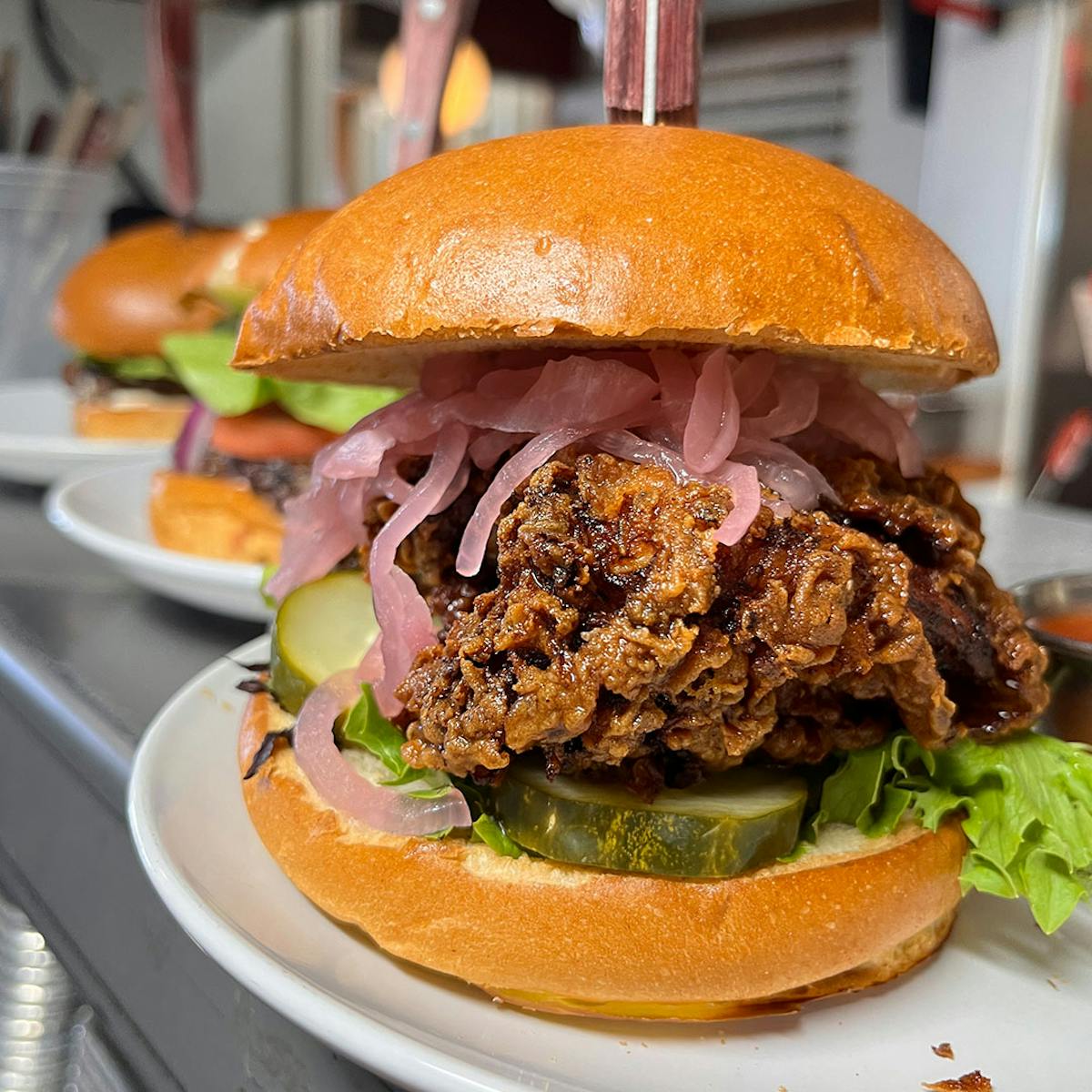 a sandwich sitting on top of a plate of food