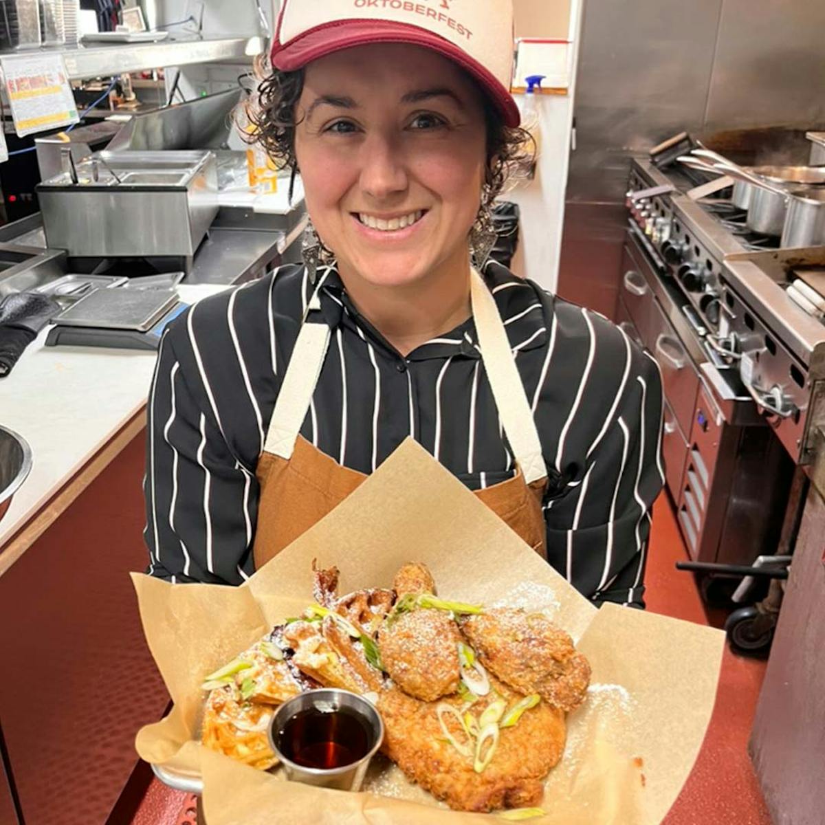 a woman eating a donut