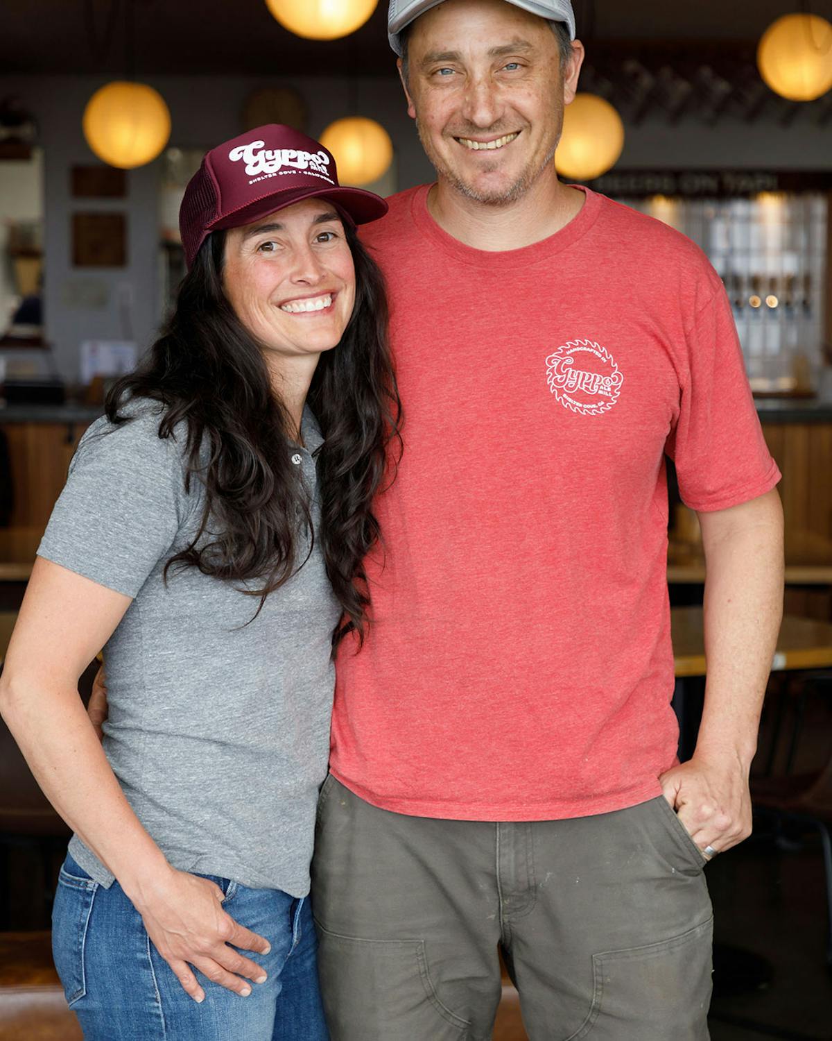 a man and a woman standing in a room