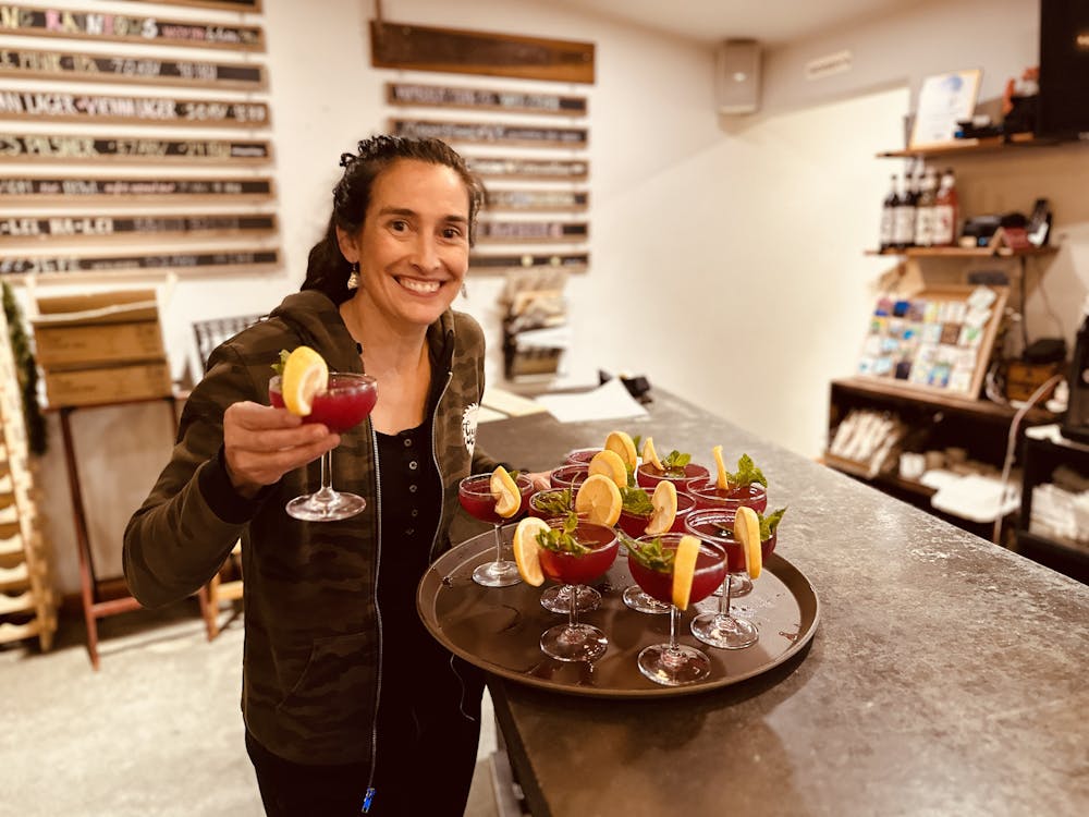 a person standing in front of a table