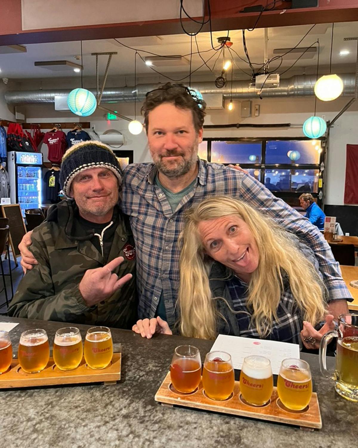 a man and a woman sitting on a table