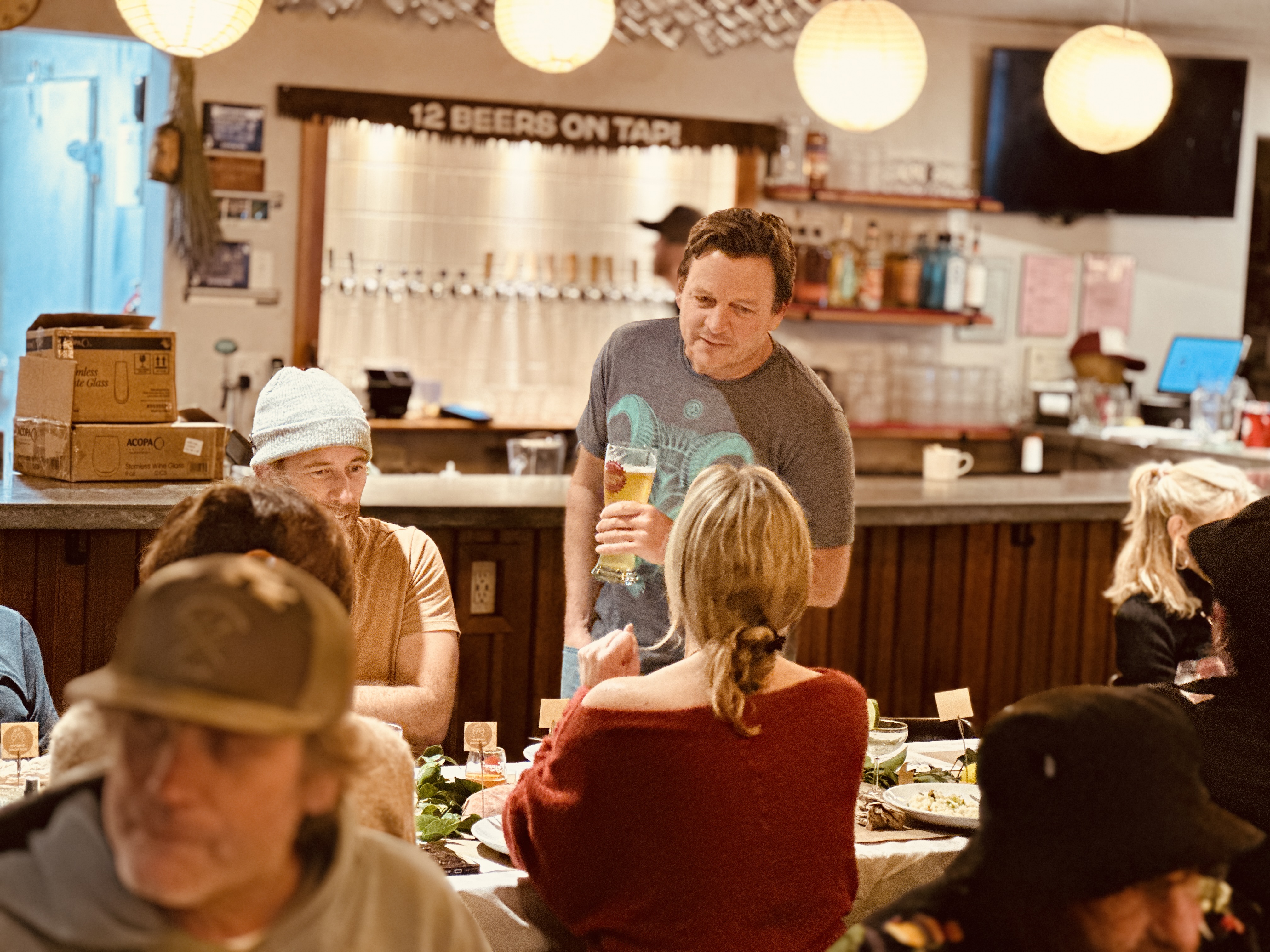 a group of people sitting around a table