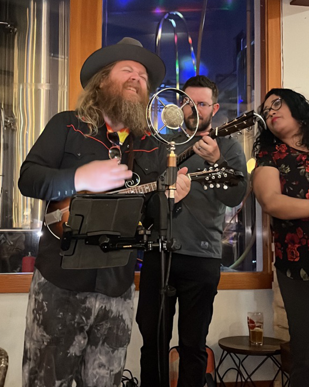 a group of people holding wine glasses