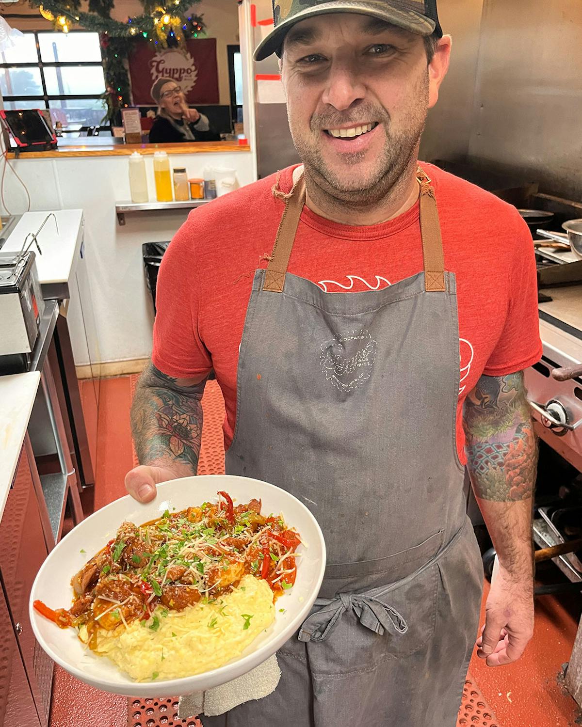 a man holding a plate of food