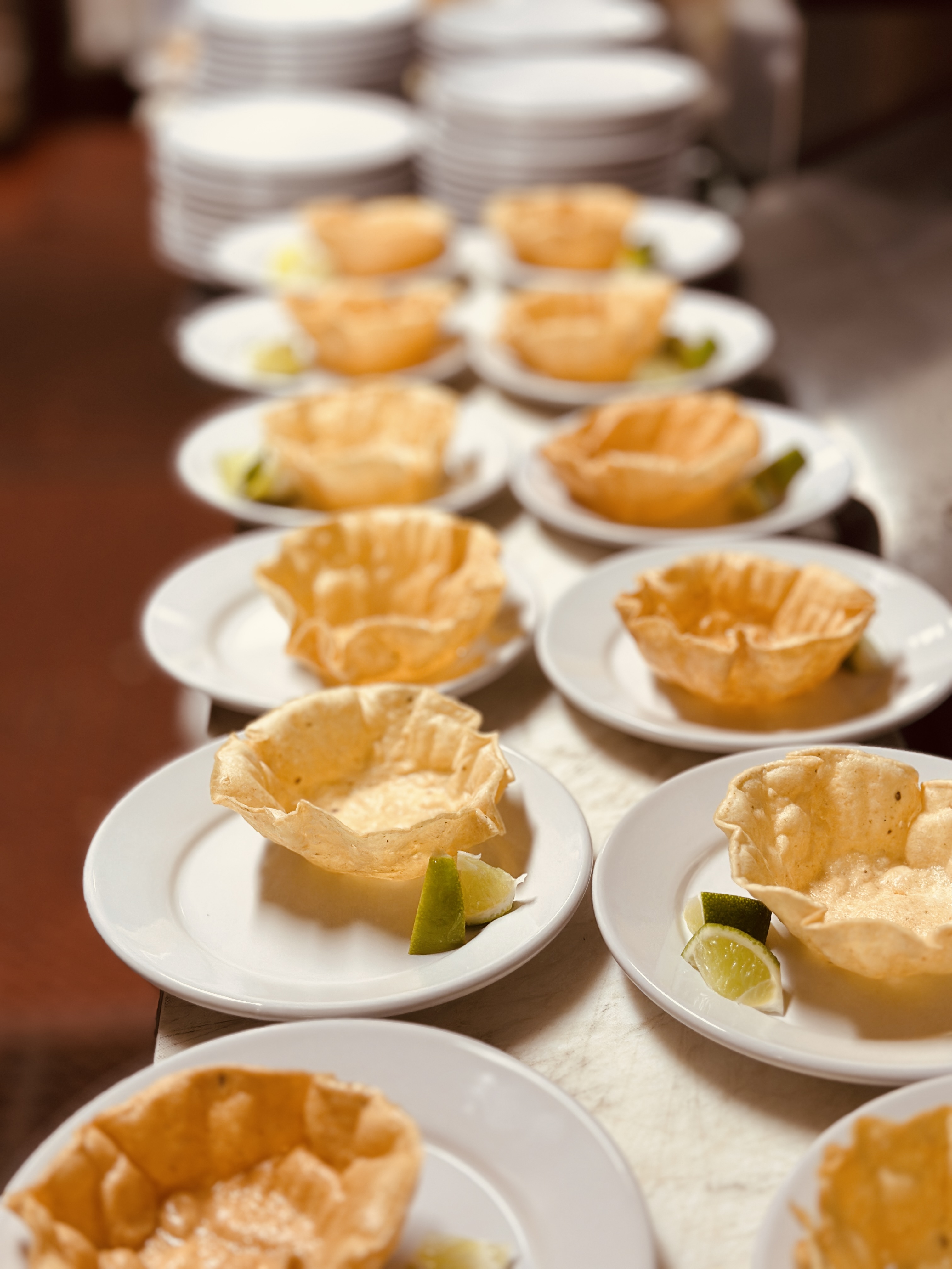 a row of plates with food on them