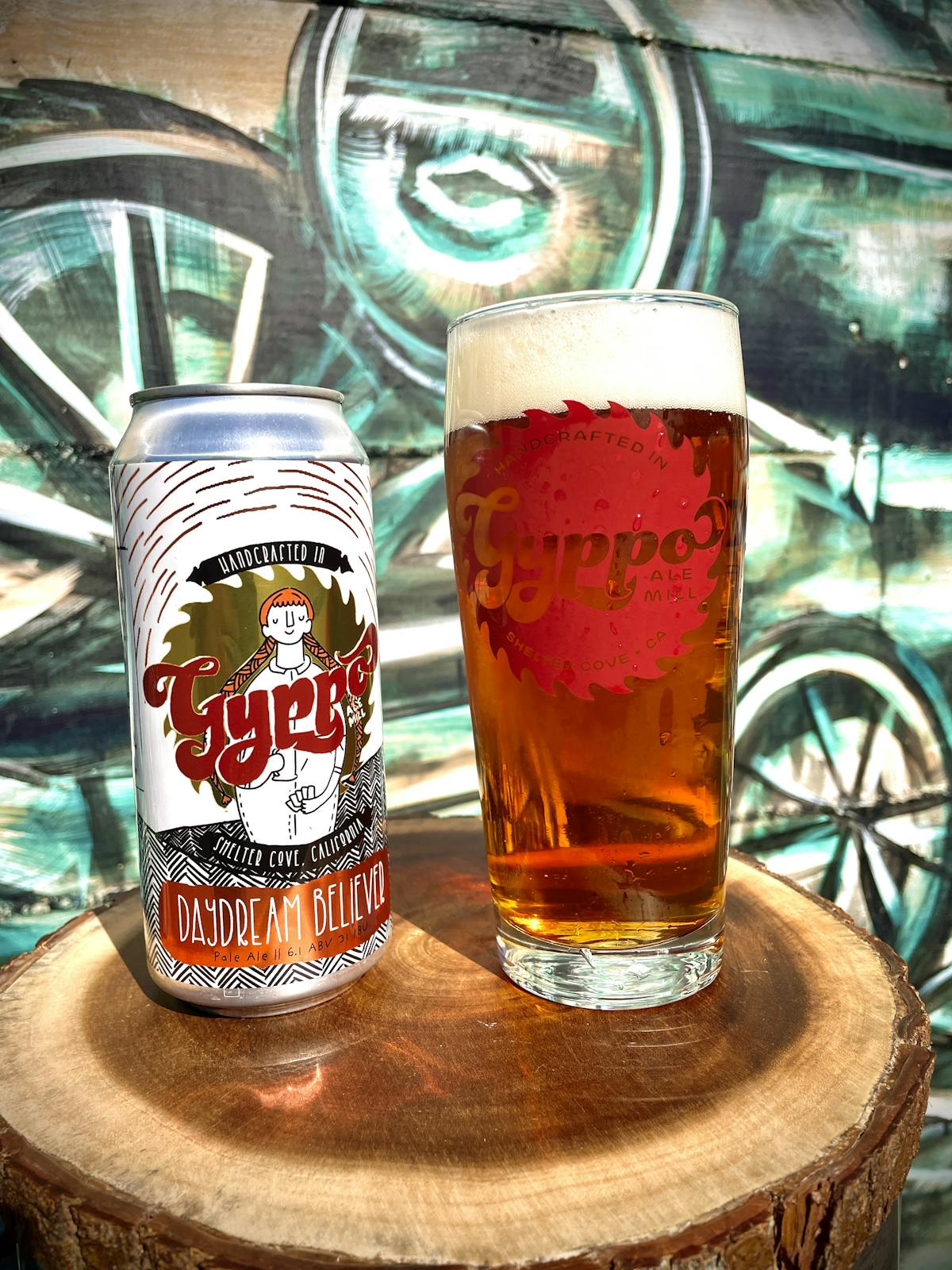 a glass of beer on a table