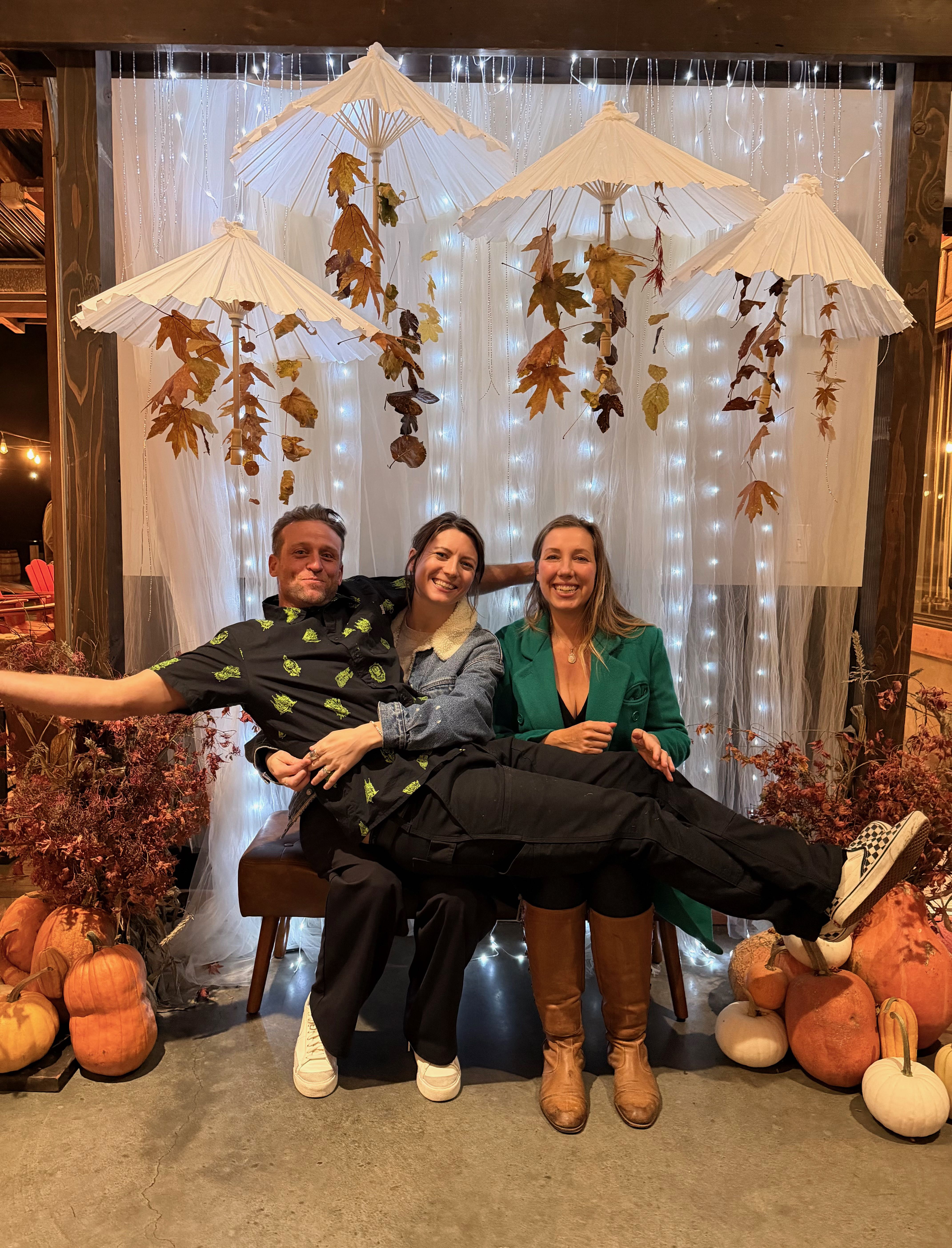 a group of people sitting in front of a building