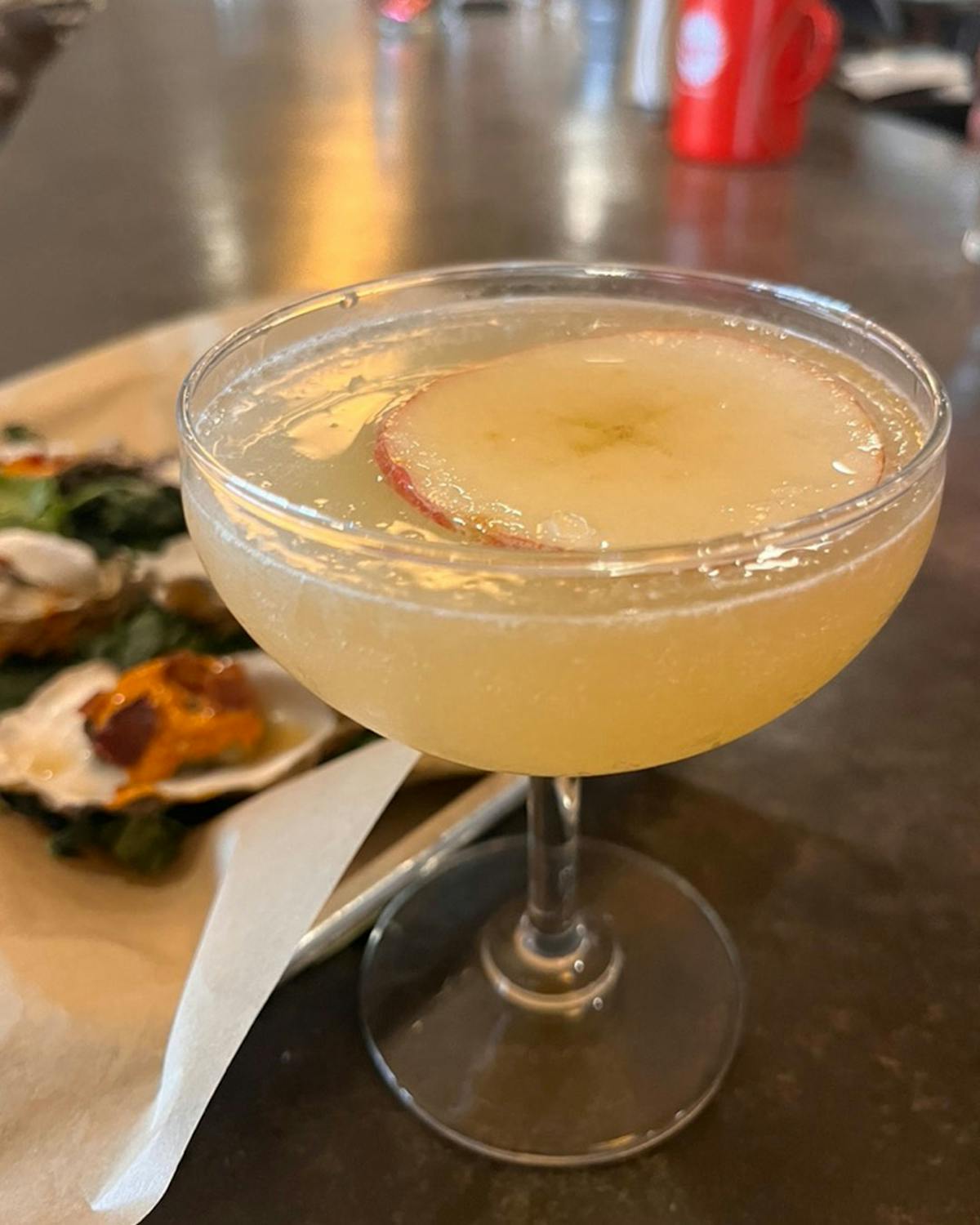 a glass cup on a plate