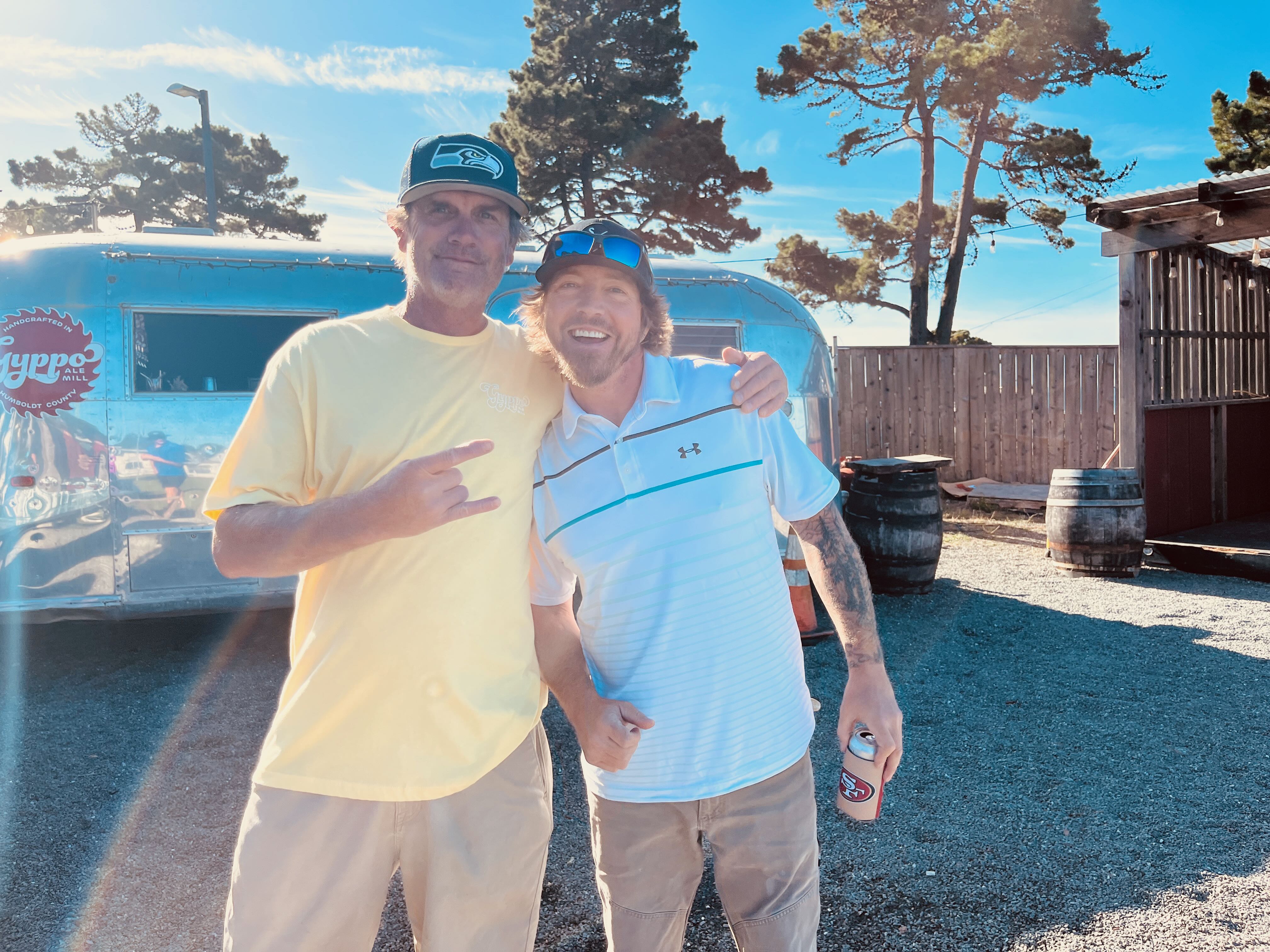 two men posing for a picture