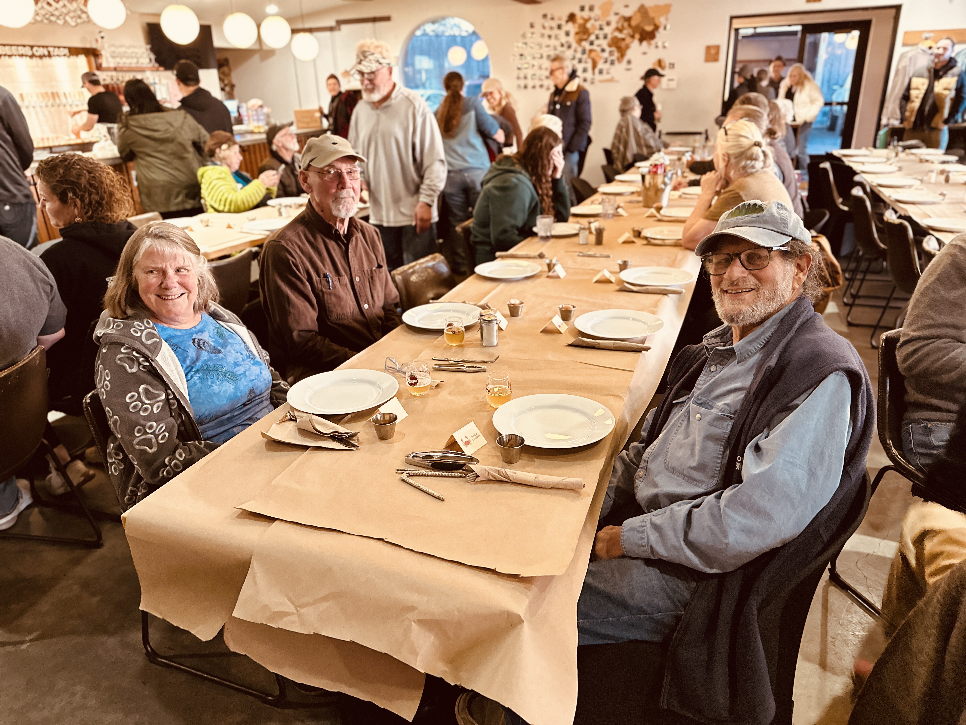 a group of people sitting at a table