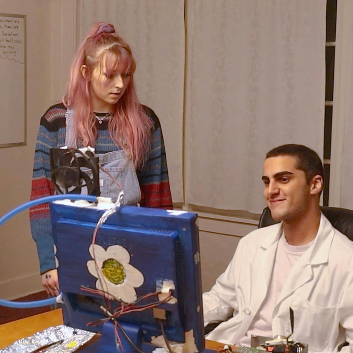 a group of people sitting at a table
