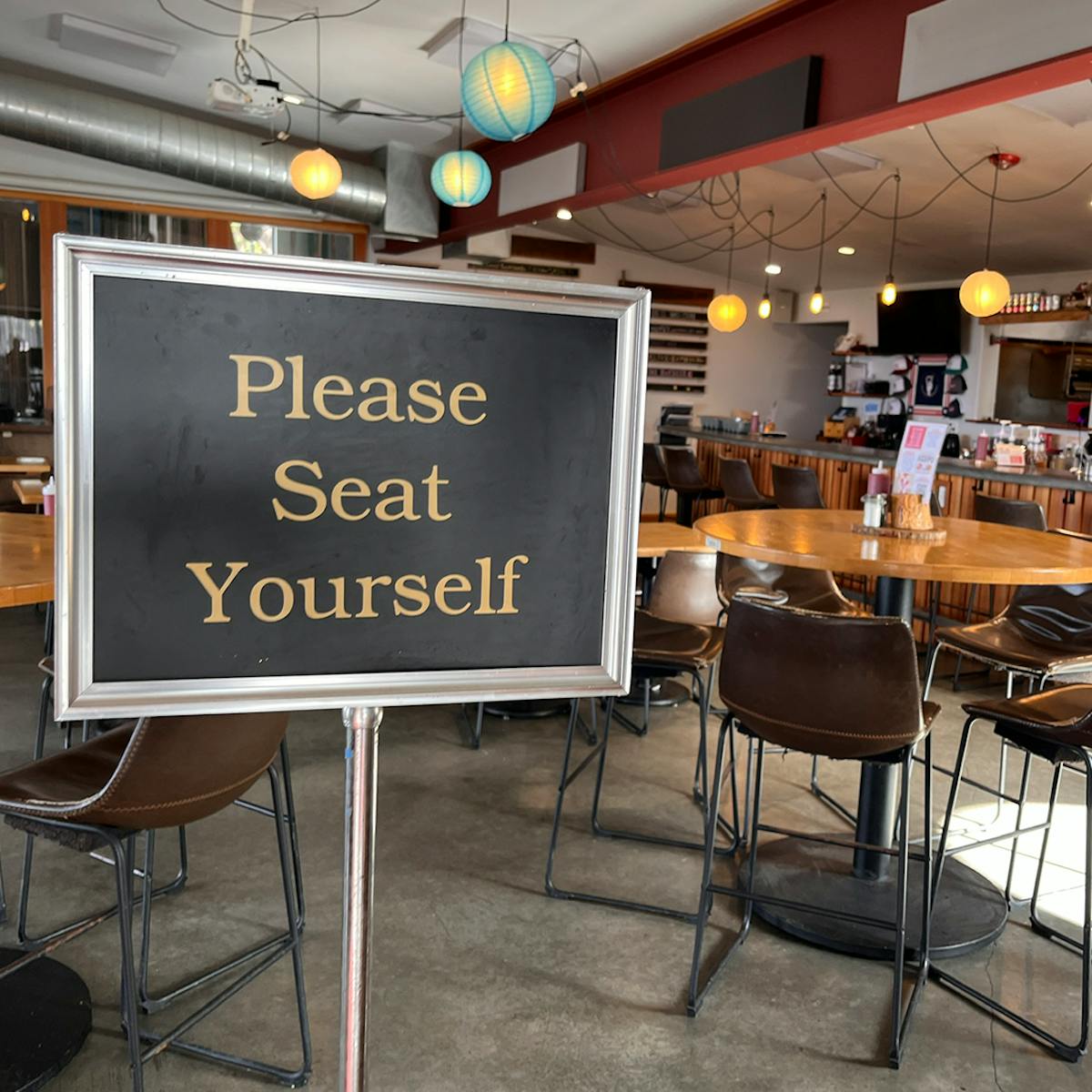 a room that has a sign on a table