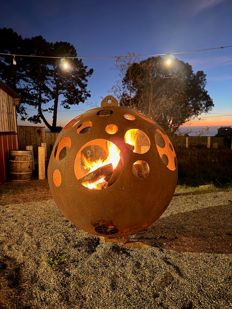 a train sitting on top of a grass covered field