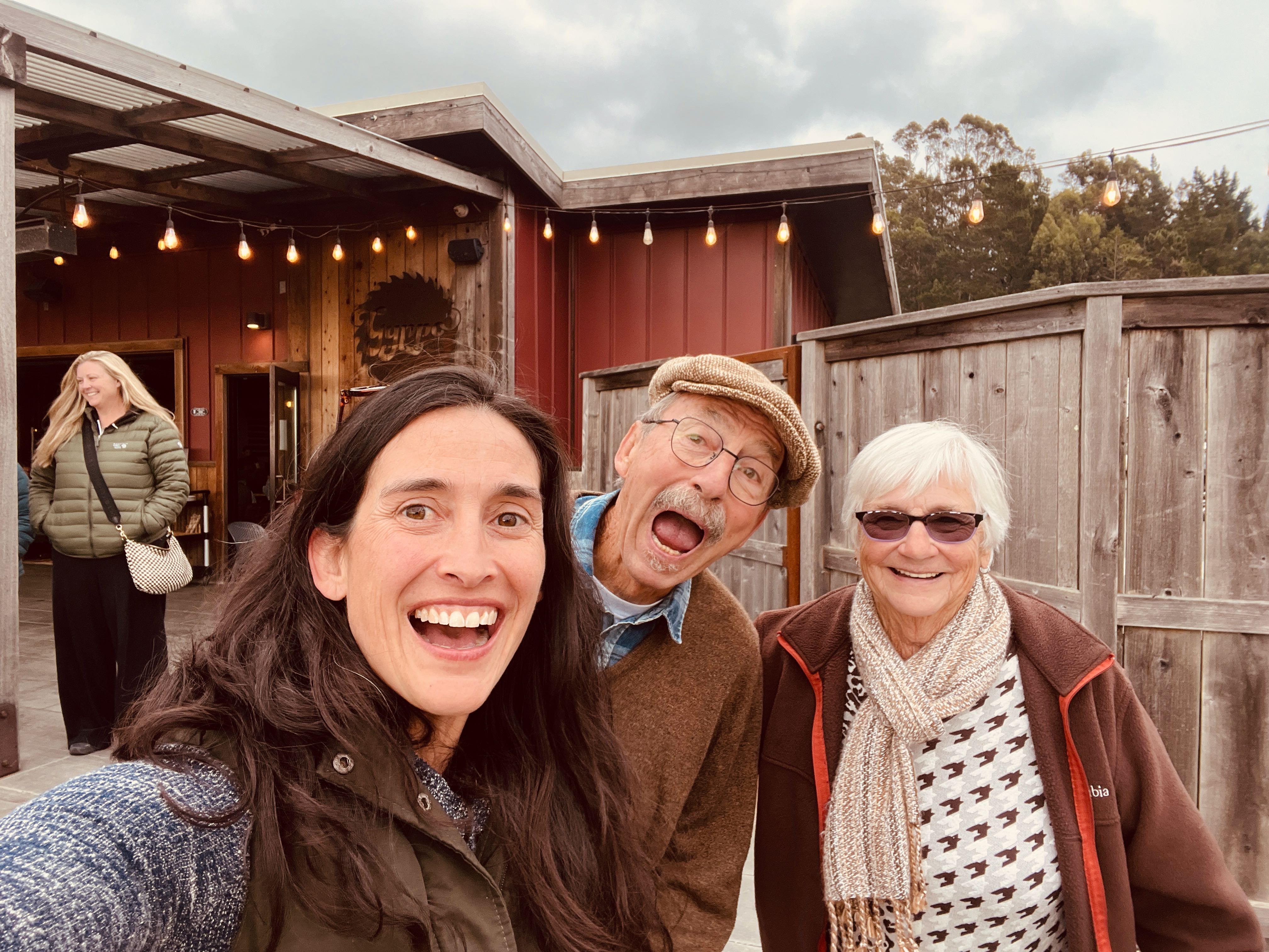 a group of people posing for a selfie