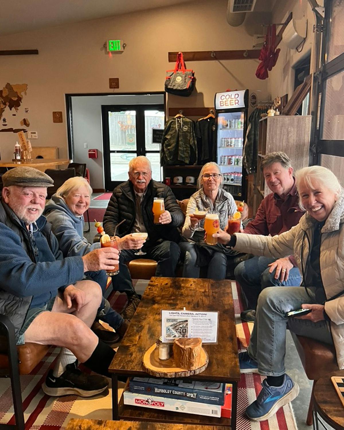 a group of people sitting at a table