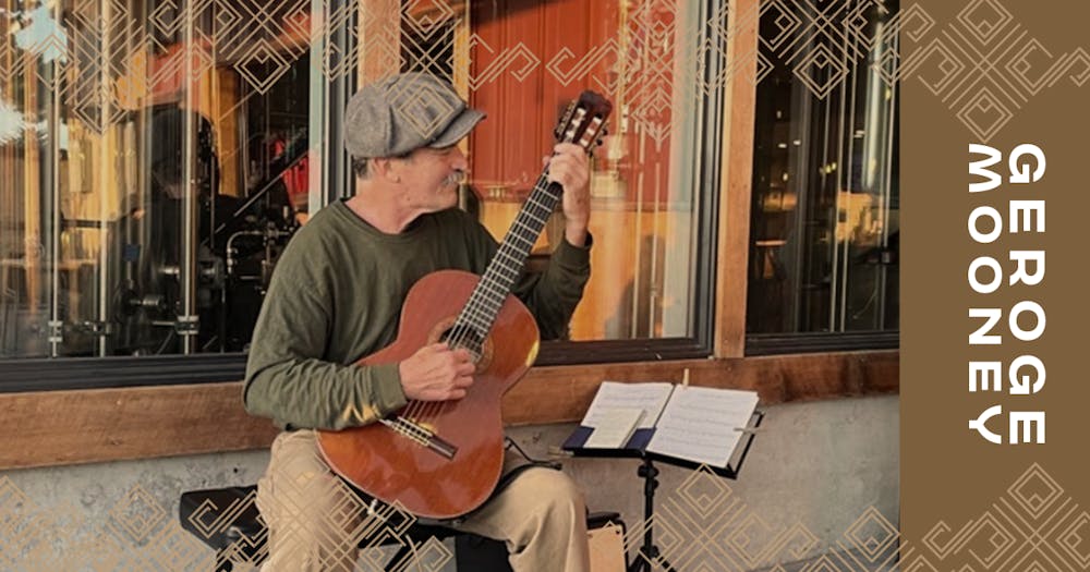 a person holding a guitar