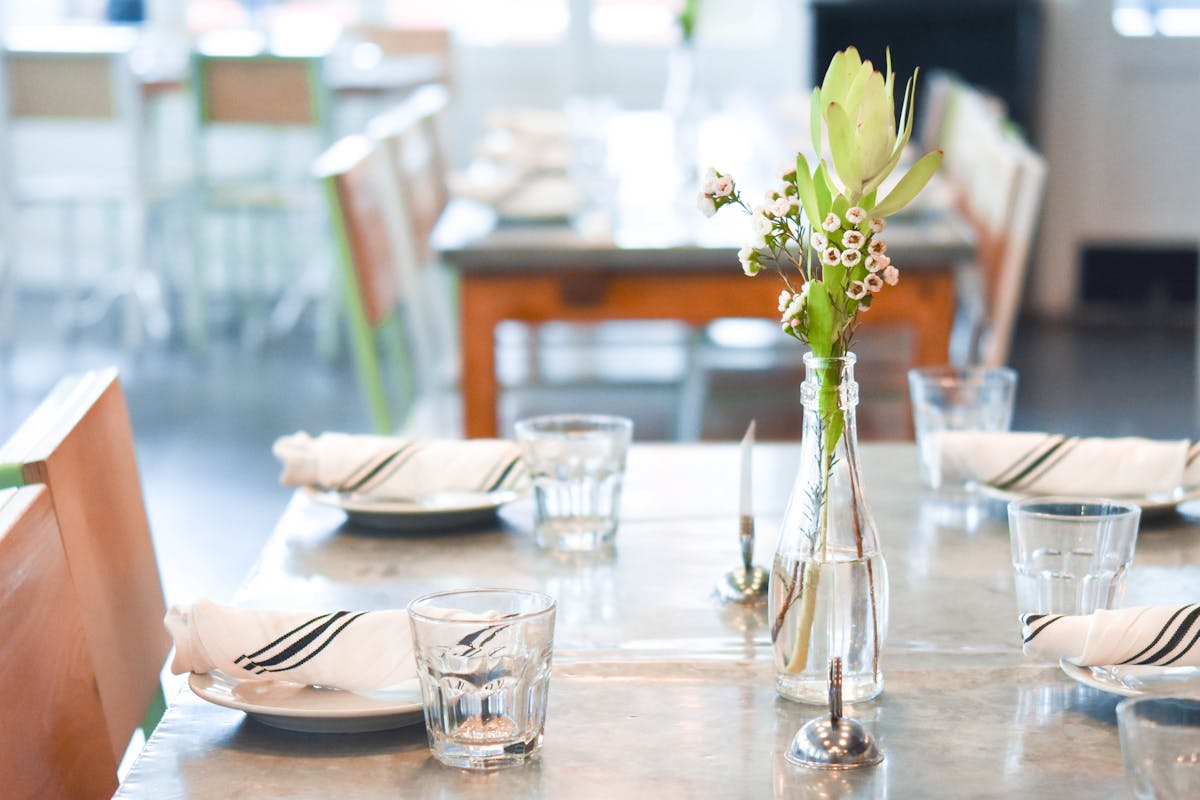 a vase of flowers on a table