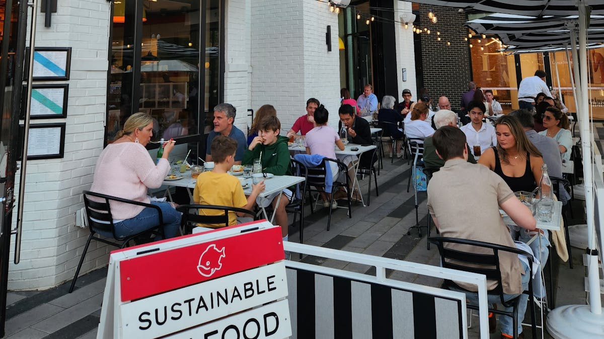 a group of people in a restaurant